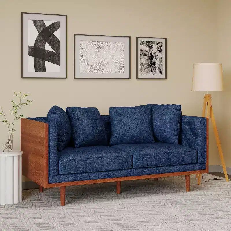 Causeuse capitonnée avec coussins décoratifs