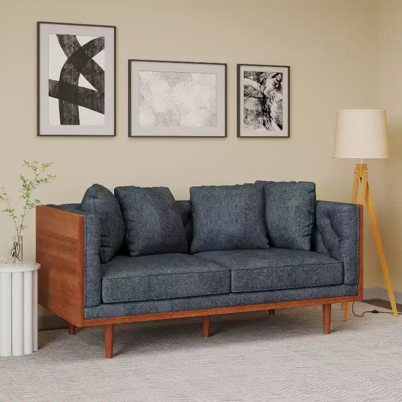 Causeuse capitonnée avec coussins décoratifs