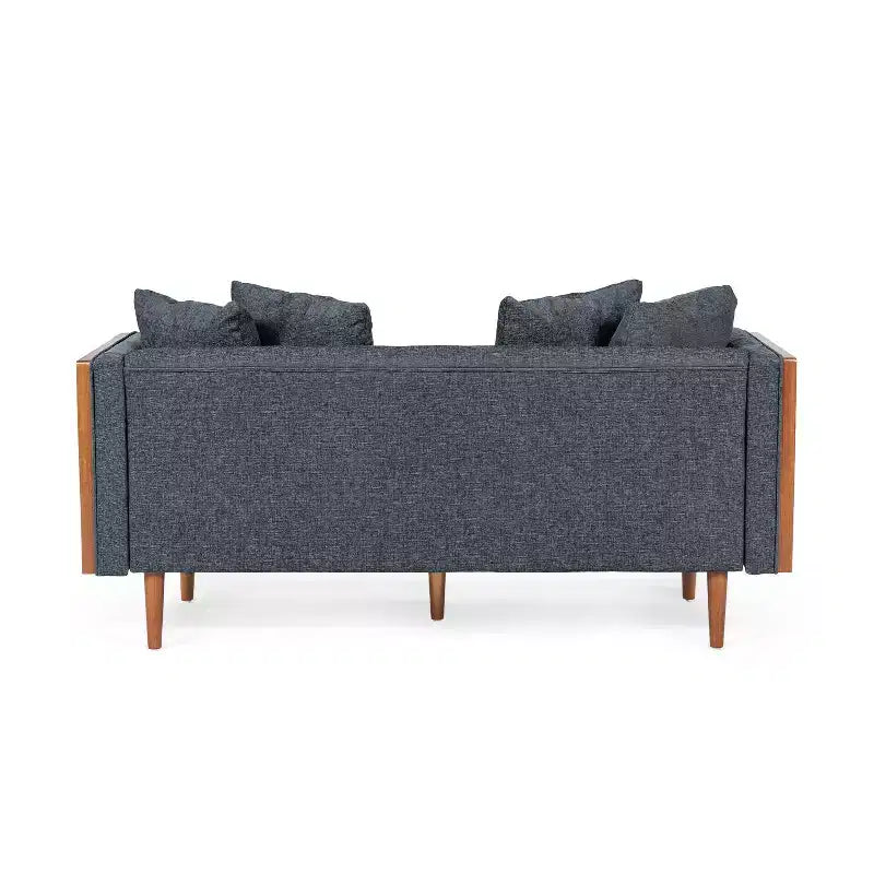Causeuse capitonnée avec coussins décoratifs