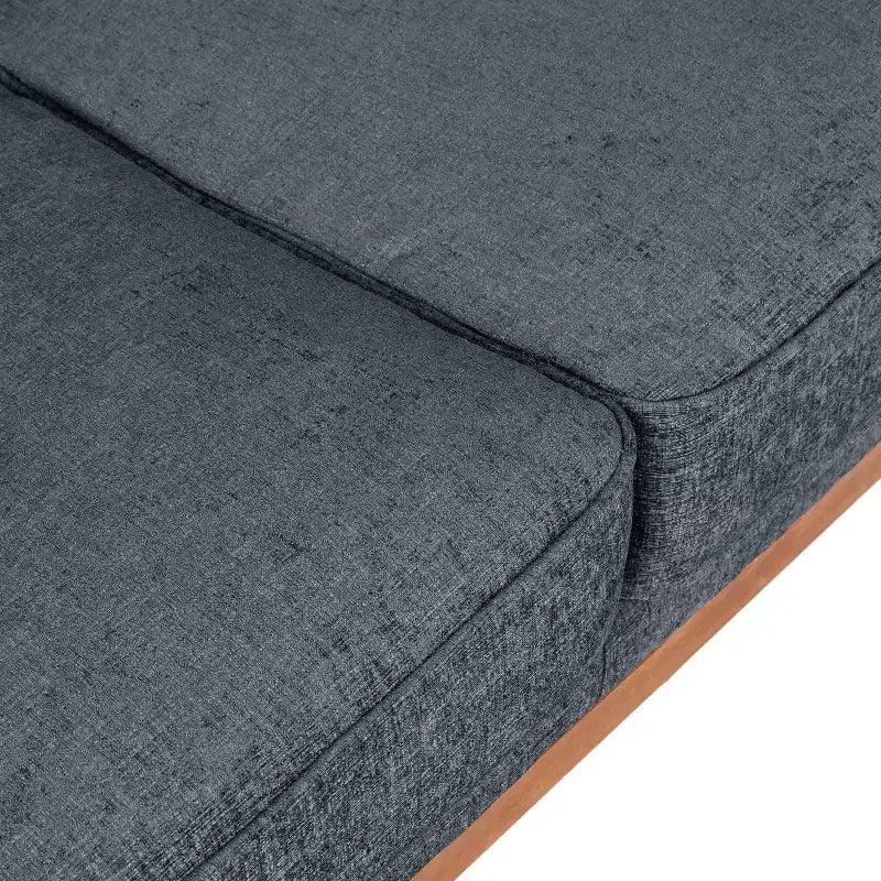 Causeuse capitonnée avec coussins décoratifs