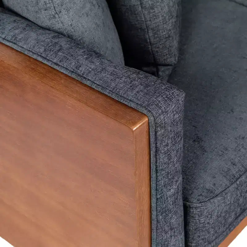 Causeuse capitonnée avec coussins décoratifs