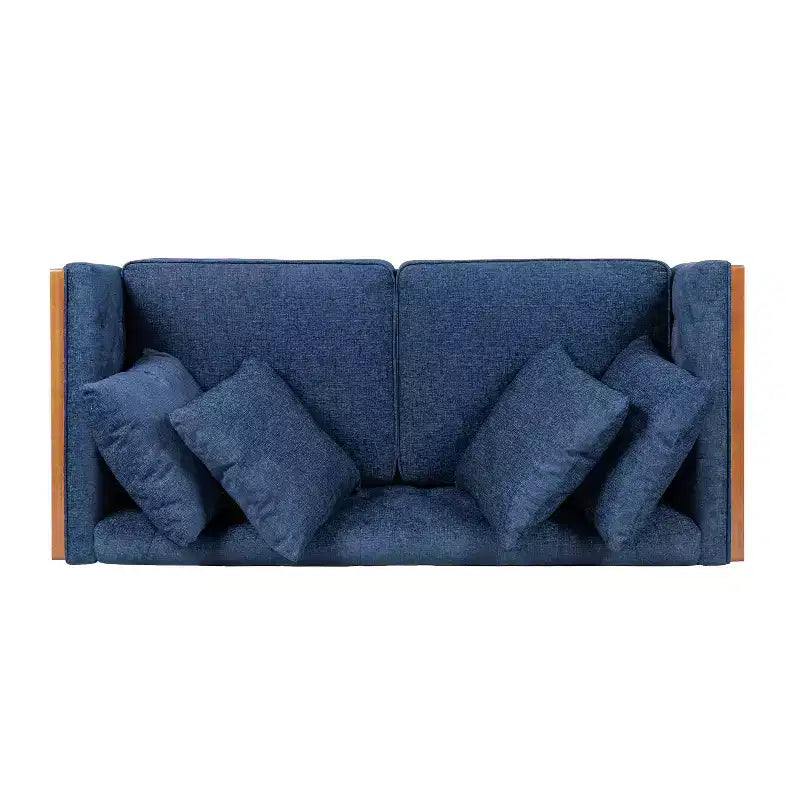 Causeuse capitonnée avec coussins décoratifs