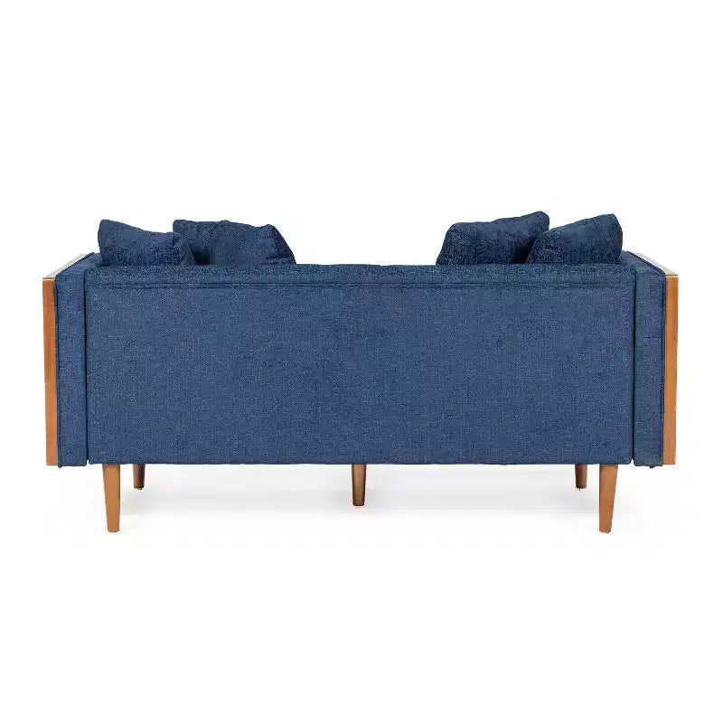Causeuse capitonnée avec coussins décoratifs