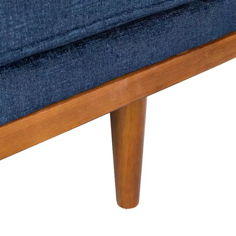 Causeuse capitonnée avec coussins décoratifs
