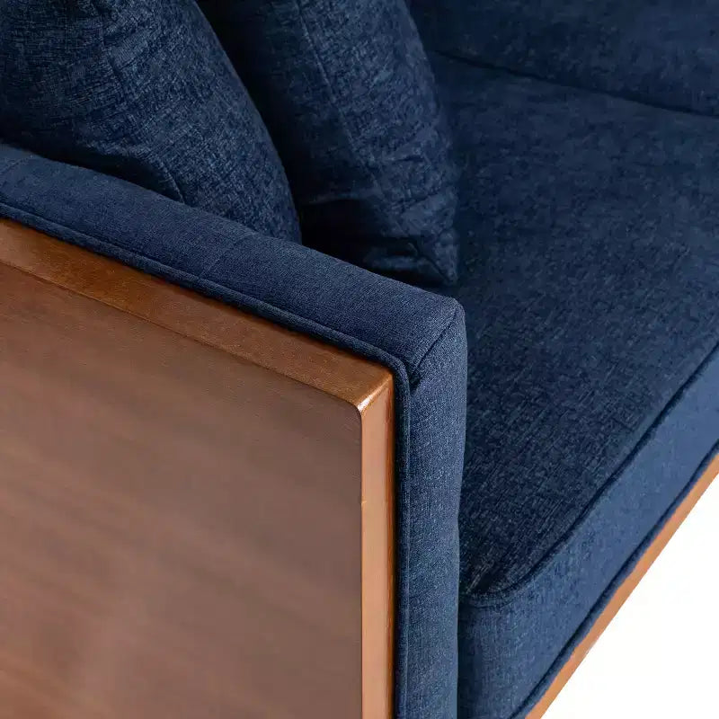 Causeuse capitonnée avec coussins décoratifs